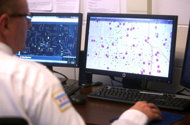 In this photo from 2017, police monitor ShotSpotter and other crime detection programs at the Chicago Police Department 7th District&apos;s Strategic Decision Support Center. (Michael Tercha/Chicago Tribune/Tribune News Service via Getty Images)