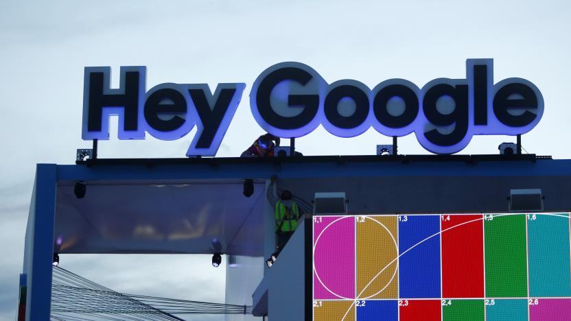 Workers set up a Hey Google booth at the Las Vegas Convention Center in preparation for the 2018 CES in Las Vegas, Nevada, U.S. January 6, 2018. REUTERS/Steve Marcus