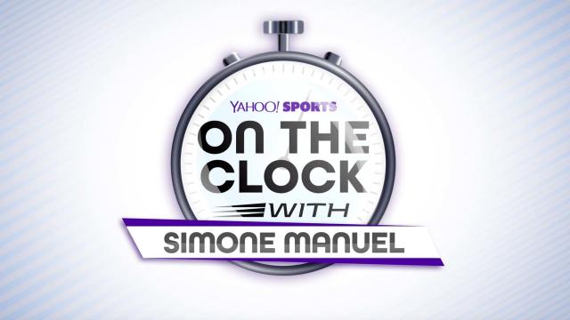 On the clock with Olympic gold medalist Simone Manuel