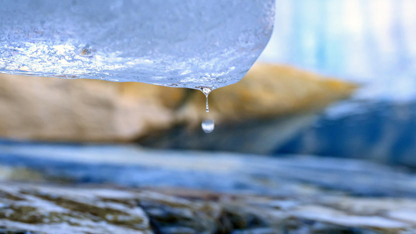 Water drips from a section of the melting Grinnell Glacier in Glacier National Park, Montana, on October 19, 2023. (Photo by JOSH EDELSON / AFP) (Photo by JOSH EDELSON/AFP via Getty Images)