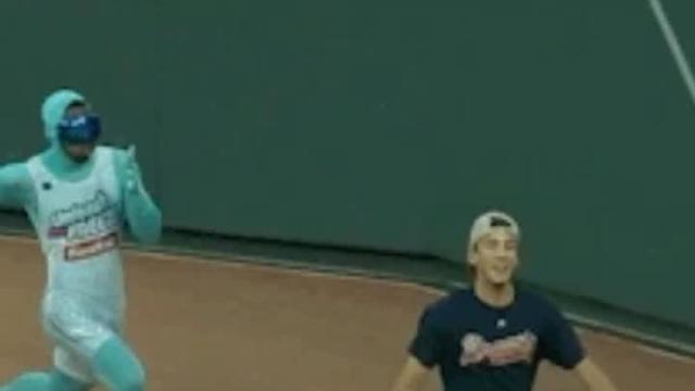 Braves fan takes embarrassing tumble trying to race 'The Freeze'