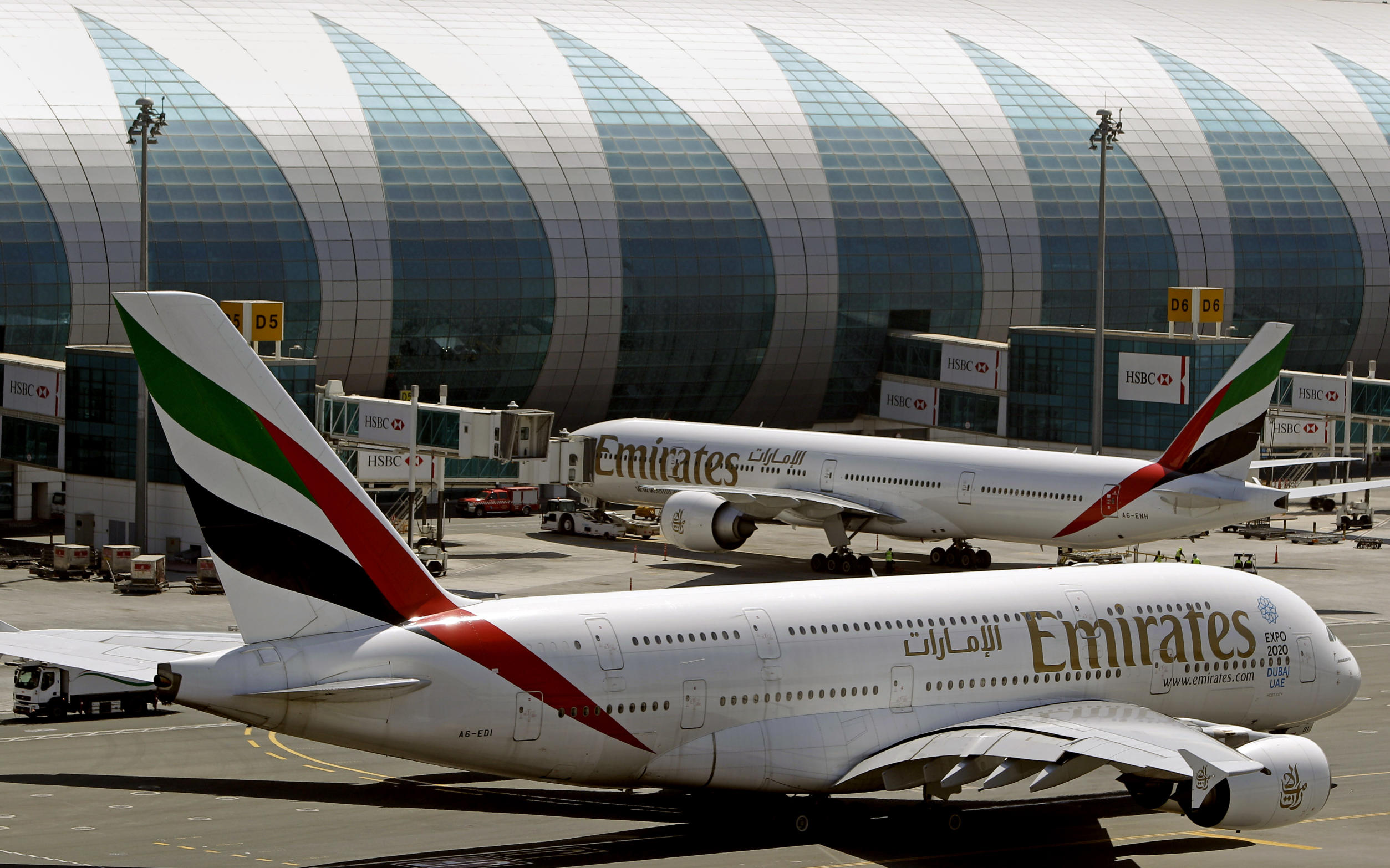 The Latest: Royal Jordanian to enforce ban starting Friday