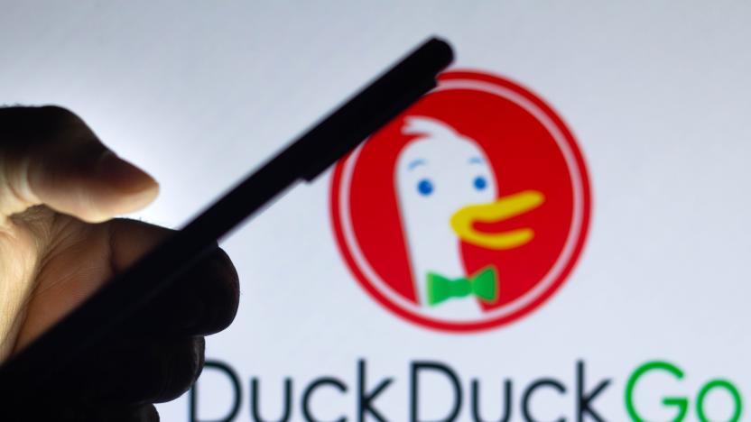 BRAZIL - 2021/08/10: In this photo illustration, a silhouette of a hand holding a mobile phone seen displayed in front of DuckDuckGo logo  on a computer screen. (Photo Illustration by Rafael Henrique/SOPA Images/LightRocket via Getty Images)