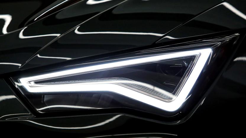 A LED headlight on a new black car in Spain. Photographer: Angel Garcia/Bloomberg