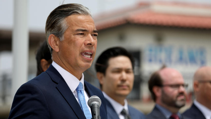 PLAYA DEL REY, CA - APRIL 28: California Attorney General Rob Bonta, flanked by his legal team, announced Thursday at Dockweiler State Beach that his office has launched an unprecedented investigation into the fossil fuel and petrochemical industries alleged role in causing and exacerbating the plastic pollution crisis on Thursday, April 28, 2022 in Playa Del Rey, CA. (Gary Coronado / Los Angeles Times via Getty Images)