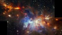 Space image, showing forming stars in the Serpens Nebula. Red, orange, blue, black, diffraction spikes.