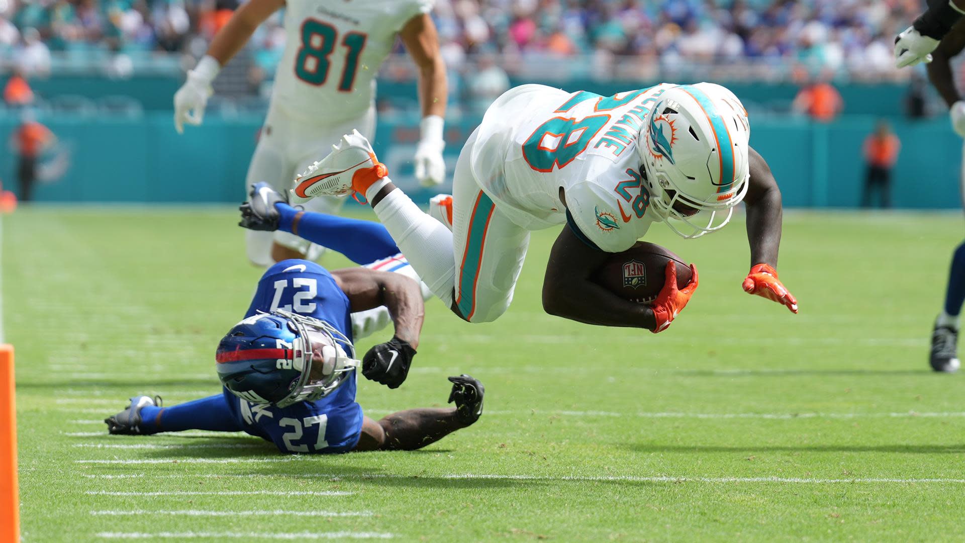 Dolphins orange jersey for practice player of the day tracker