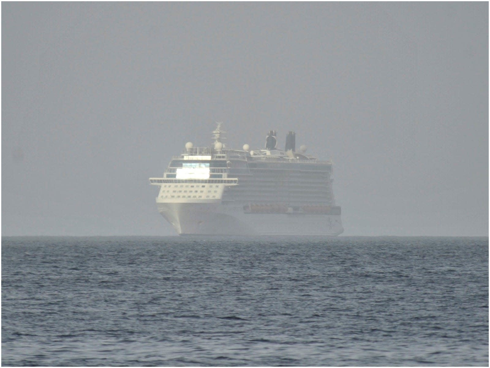 Luxury ships from the Royal Caribbean and Carnival Cruise lines sail to help and evacuate islanders in the wake of a volcanic eruption