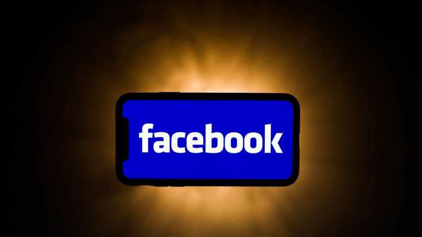 Facebook logo is seen displayed on phone screen in this illustration photo taken in Poland on July 23, 2020. Messenger, developed by Facebook, has introduced feature called Rooms that allows group video chats. Video meeting apps gained popularity during the coronavirus pandemic.
 (Photo illustration by Jakub Porzycki/NurPhoto via Getty Images)