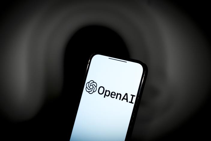 The OpenAI ChatGPT logo is seen on a mobile device screen in this illustration photo taken in Warsaw, Poland on 01 June, 2024. (Photo by Jaap Arriens/NurPhoto via Getty Images)