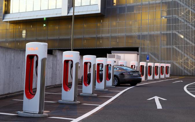 Tesla Supercharger stations are seen at a motorway service area near Affoltern am Albis, Switzerland October 20, 2021. Picture taken October 20, 2021.  REUTERS/Arnd Wiegmann