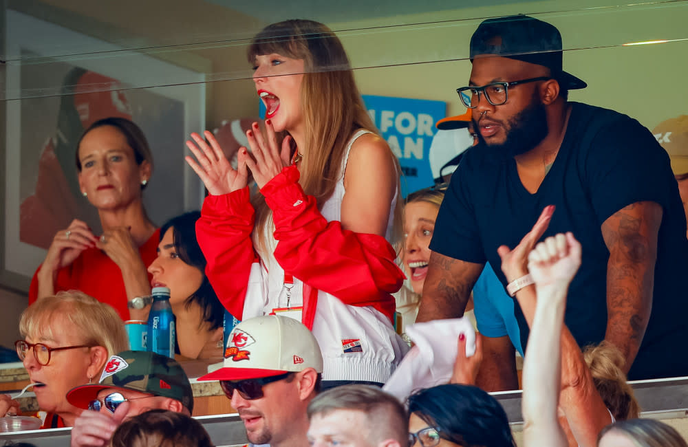 Travis Kelce takes THREE HOURS to pick his gameday outfits, turned a  bedroom into a wardrobe and admits his fashion sense is 'not for everybody'  - as Taylor Swift's boyfriend lifts the