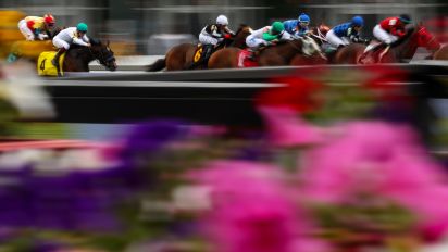 Getty Images - BALTIMORE, MARYLAND - MAY 20: Horses race ahead of the 148th Running of the Preakness Stakes at Pimlico Race Course on May 20, 2023 in Baltimore, Maryland. (Photo by Patrick Smith/Getty Images)