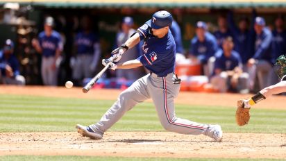 Getty Images - OAKLAND, CALIFORNIA - MAY 07: Corey Seager #5 of the Texas Rangers hits a single against the Oakland Athletics in his second at-bat of the second inning at Oakland Coliseum on May 7, 2024 in Oakland, California.  (Photo by Ezra Shaw/Getty Images)