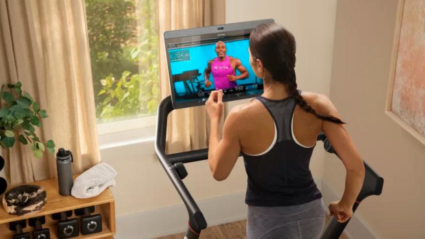 Woman using a Peloton Tread.