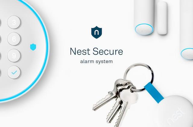 Nest Secure promotional image from 2017, featuring the text "Nest Secure alarm system" in the center, surrounded by the Nest Secure hub, sensors and tag (on a keychain)