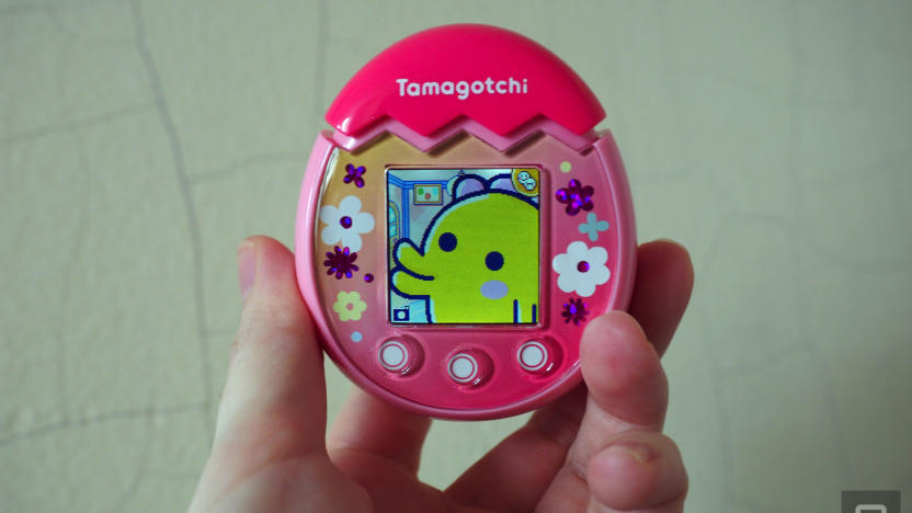 Pink Tamagotchi Pix with a yellow creature on the screen