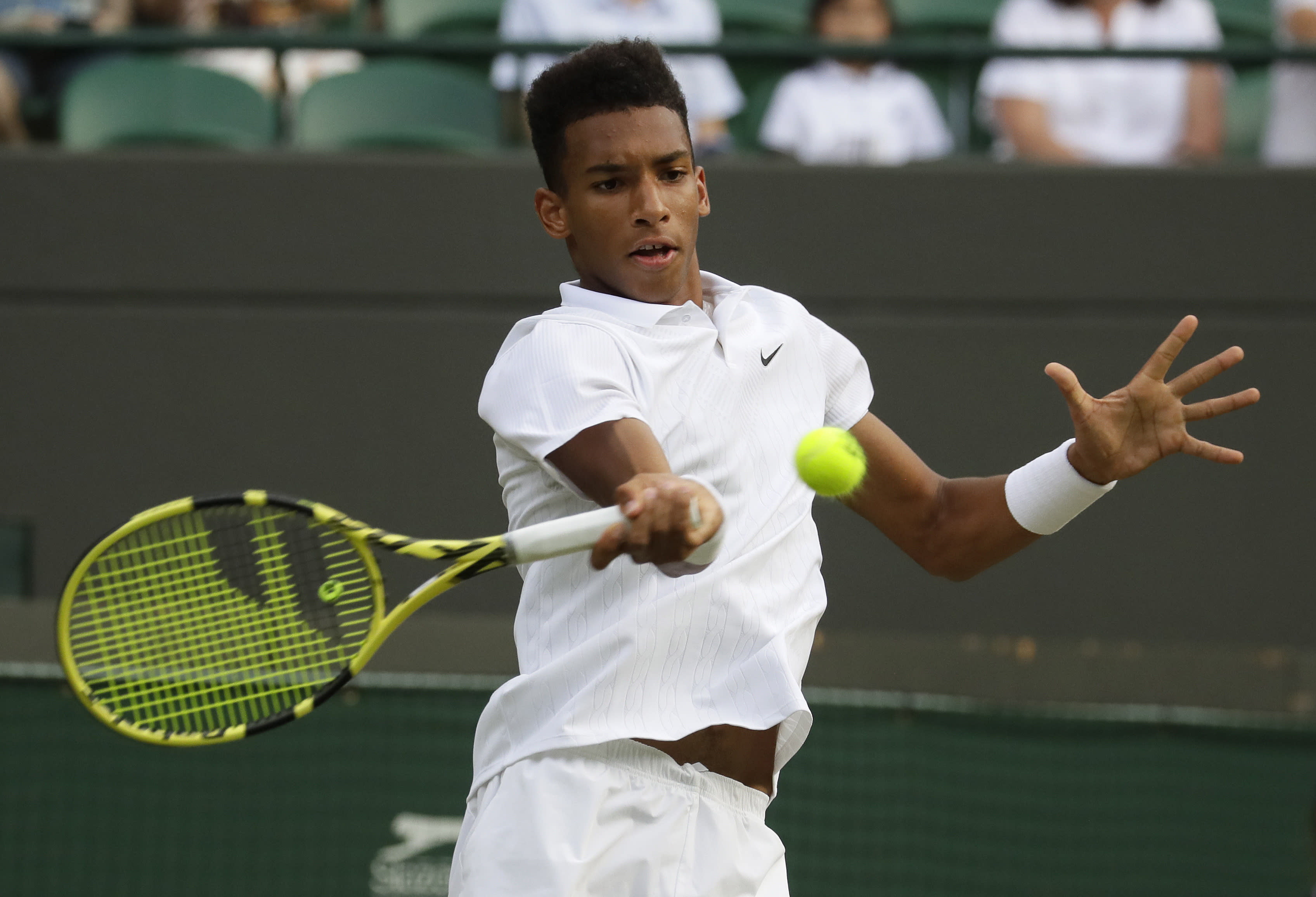 The Latest Canadian teen AugerAliassime loses at Wimbledon