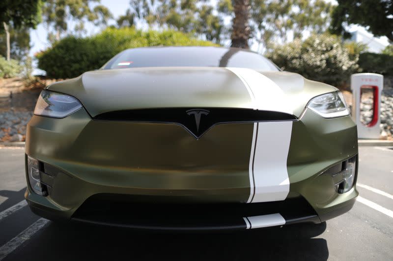 Tesla rallies after upgrading Canaccord says it’s like Apple