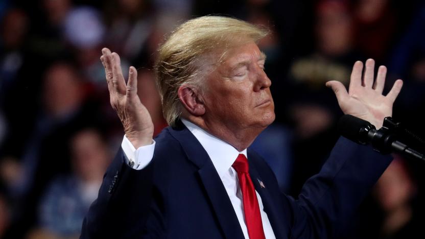 U.S. President Donald Trump reacts during a campaign rally in Battle Creek, Michigan, U.S., December 18, 2019. REUTERS/Leah Millis