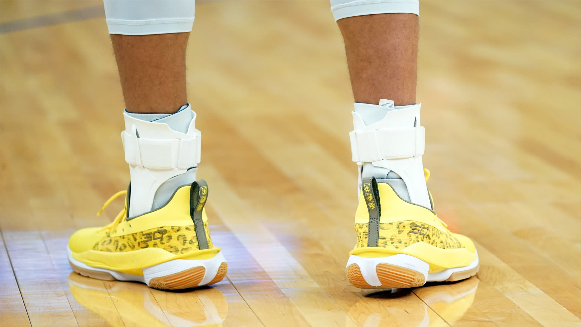 Steph Curry wears shoes designed by 