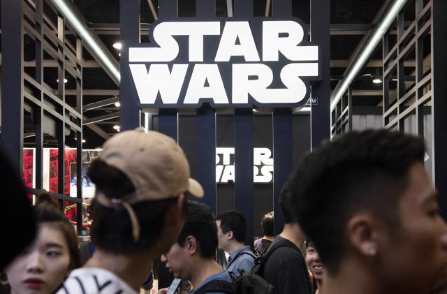 HONG KONG, CHINA - 2019/07/28: Visitors are seen at Disney's Star Wars booth during the Ani-Com & Games event in Hong Kong. (Photo by Budrul Chukrut/SOPA Images/LightRocket via Getty Images)