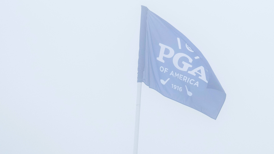 Reuters - May 18, 2024; Louisville, Kentucky, USA; A detail view of a PGA of America flag during a heavy fog delay before the continuation of the second round of the PGA Championship golf tournament at Valhalla Golf Club. Mandatory Credit: Matt Stone-USA TODAY Sports