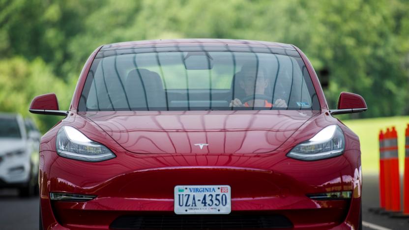 Joe Young, media relations associate for the Insurance Institute for Highway Safety (IIHS) drives a 2018 Tesla Model 3 at the IIHS-HLDI Vehicle Research Center in Ruckersville, Virginia, U.S., July 22, 2019.  Picture taken July 22, 2019. REUTERS/Amanda Voisard