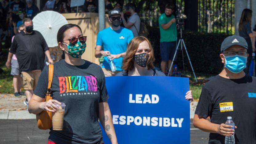 Employees of the video game company, Activision Blizzard, hold a walkout and protest rally to denounce the companys response to a California Department of Fair Employment and Housing lawsuit and to call for changes in conditions for women and other marginalized groups, in Irvine, California, on July 28, 2021.  (Photo by DAVID MCNEW / AFP) (Photo by DAVID MCNEW/AFP via Getty Images)