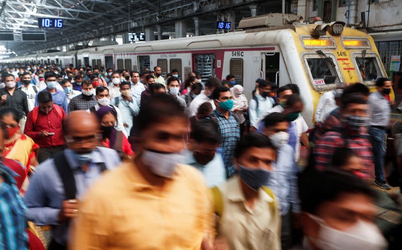 Virus infections in India peaking at three weeks, Mumbai hires police to enforce masks