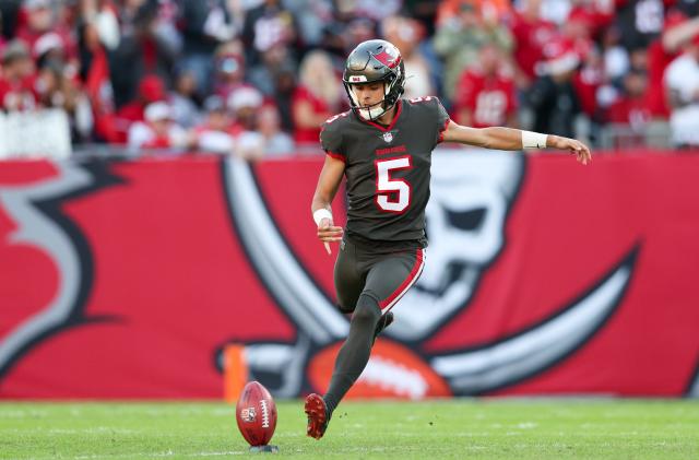 Dec 18, 2022; Tampa, Florida, USA;  Tampa Bay Buccaneers punter Jake Camarda (5) kicks off against the Cincinnati Bengals in the first quarter at Raymond James Stadium. Mandatory Credit: Nathan Ray Seebeck-USA TODAY Sports