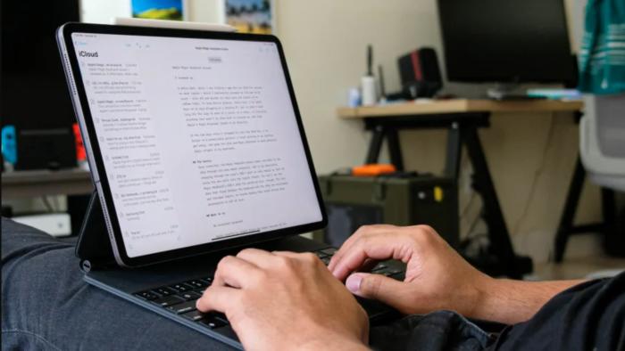 An image of the keyboard on a lap. 