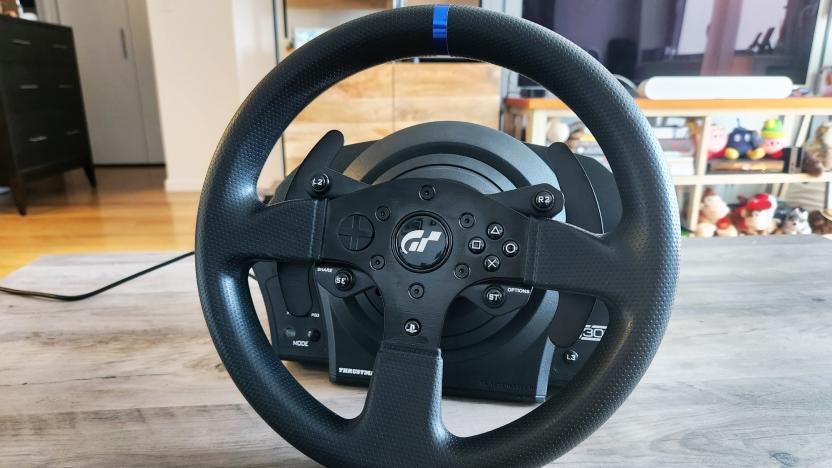 Thrustmaster's T300 RS GT Edition racing wheel, resting on a desktop.