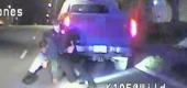 Dashcam of the unarmed Jerime Mitchell struggling with officer Lucas Jones. (AP)