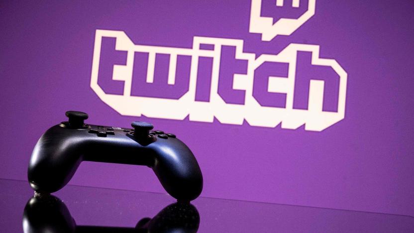 A gamepad is pictured as a screen displays the online Twitch plateform in Toulouse, southwestern France, on June 15, 2021. (Photo by Lionel BONAVENTURE / AFP) (Photo by LIONEL BONAVENTURE/AFP via Getty Images)