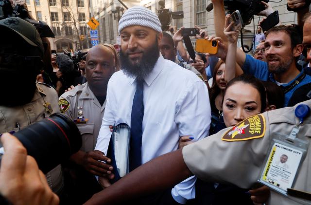 Adnan Syed, whose case was chronicled in the hit podcast “Serial,” leaves the courthouse after a judge overturned Syed's 2000 murder conviction and ordered a new trial during a hearing at the Baltimore City Circuit Courthouse in Baltimore, Maryland U.S., September 19, 2022. REUTERS/Jonathan Ernst