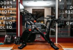 NEW YORK, NY - DECEMBER 04: A Peloton stationary bike sits on display at one of the fitness company's studios on December 4, 2019 in New York City. Peloton and its model of on-demand video cycling classes has come under fire after the release of a new commercial that has been criticized by some as sexist and classist. (Photo by Scott Heins/Getty Images)