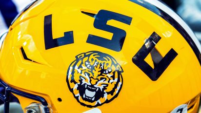 Getty Images - BATON ROUGE, LA - SEPTEMBER 23: An LSU helmet rests on the sideline during a game between the LSU Tigers and the Arkansas Razorbacks on September 23, 2023, at Tiger Stadium in Baton Rouge, Louisiana. (Photo by John Korduner/Icon Sportswire via Getty Images)