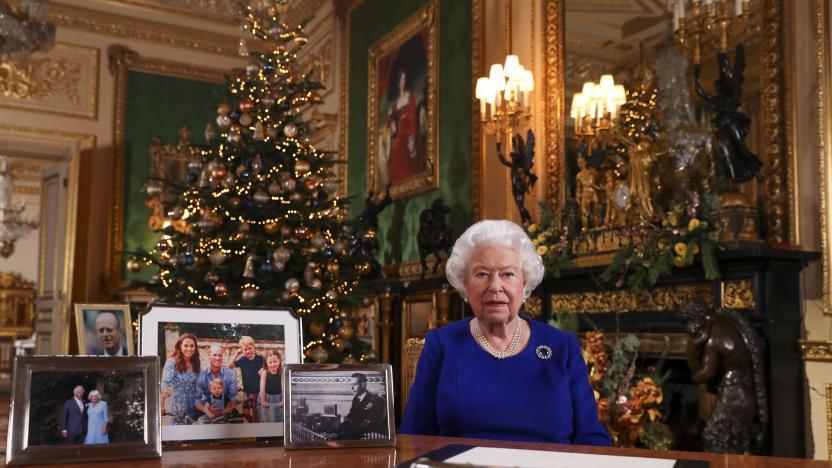 A picture released on December 24, 2019 shows Britain's Queen Elizabeth II posing for a photograph after she recorded her annual Christmas Day message, in Windsor Castle, west of London. - During her traditional Christmas address, Queen Elizabeth II intends to call on the British to overcome their divisions after a year "full of pitfalls", between Brexit tearing apart her country and scandals shaking the British royal family, according to extracts from the address broadcast in advance. (Photo by Steve Parsons / POOL / AFP) (Photo by STEVE PARSONS/POOL/AFP via Getty Images)