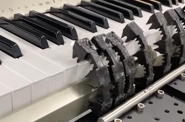 Soft robot playing the piano using pneumatic memory