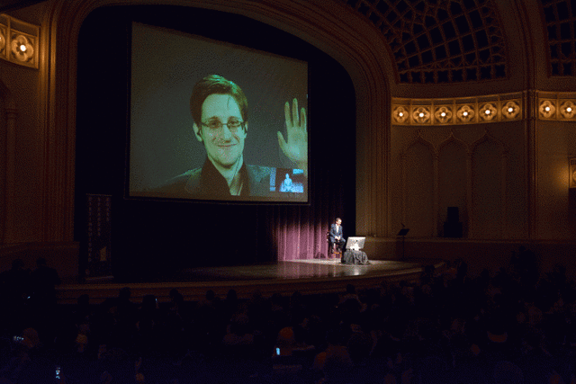 Edward Snowden appearing with Ron Suskind at the University of Colorado on Feb. 16, 2016. (Patrick Campbell/University of Colorado)