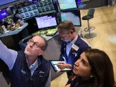 Stocks close mixed as Fed holds interest rates steady