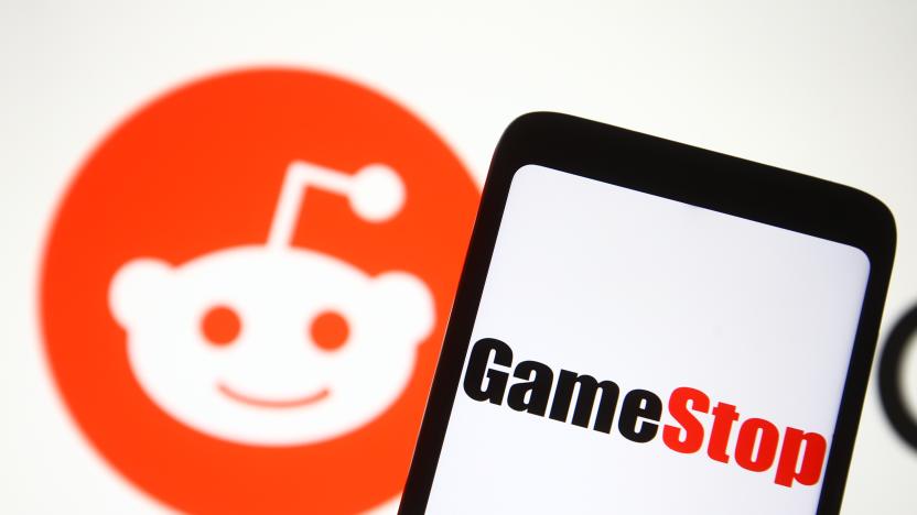 UKRAINE - 2021/02/05: In this photo illustration a GameStop logo is seen on a mobile phone screen in front of Reddit logo. (Photo Illustration by Pavlo Gonchar/SOPA Images/LightRocket via Getty Images)