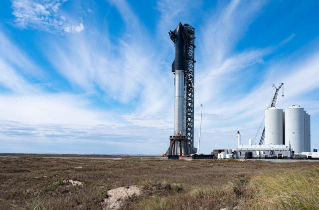 SpaceX's first orbital Starship SN20 is stacked atop its massive Super Heavy Booster 4 at the company's Starbase facility near Boca Chica Village in South Texas on February 10, 2022. - Elon Musk's SpaceX has reassembled the world's tallest rocket ahead of a highly anticipated update on the company's Starship program in South Texas. (Photo by JIM WATSON / AFP) (Photo by JIM WATSON/AFP via Getty Images)