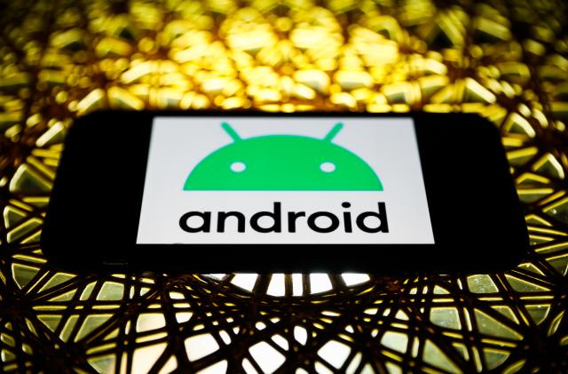 Android logo is seen displayed on a phone screen in this illustration photo taken in Poland on November 30, 2020. (Photo by Jakub Porzycki/NurPhoto via Getty Images)