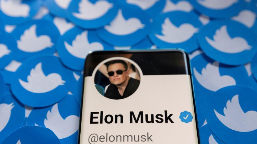 Elon Musk's Twitter profile is seen on a smartphone placed on printed Twitter logos in this picture illustration taken April 28, 2022. REUTERS/Dado Ruvic/Illustration