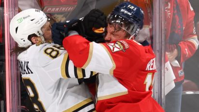 Getty Images - SUNRISE, FLORIDA - MAY 08: David Pastrnak #88 of the Boston Bruins fights with Sam Reinhart #13 of the Florida Panthers during the third period in Game Two of the Second Round of the 2024 Stanley Cup Playoffs at Amerant Bank Arena on May 08, 2024 in Sunrise, Florida.  (Photo by Joel Auerbach/Getty Images)