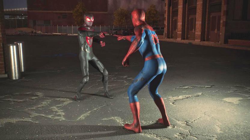 An image of one digitally rendered Spider-Man pointing at another one with a darker suit color. Both are standing in a dark alley below a bright overhead light.