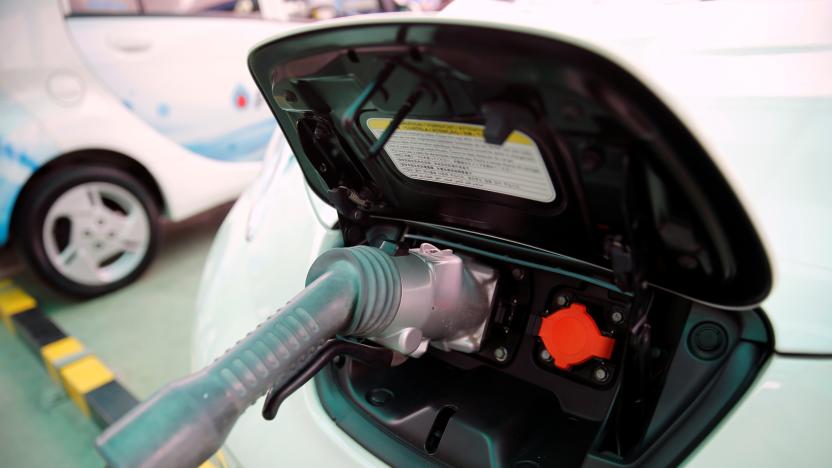 An electric car is seen while being charged during the opening of a PTT Pcl energy firm's commercial EV (Electric Vehicle) charging station, in Bangkok, Thailand August 15, 2016. REUTERS/Jorge Silva