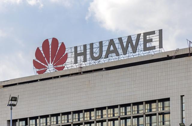 Belgrade, Serbia - August 31, 2021: Big Sign Huawei Chinese Tech Company at Top of Office Building in New Belgrade.